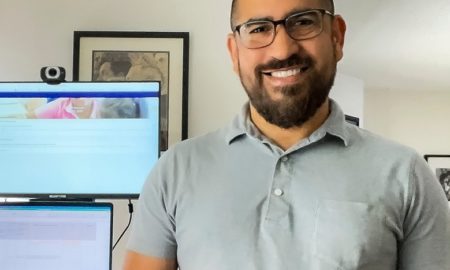 Carlos Santini is new CEO of Mizzen by Mott: photo of man in glasses with beard in front of home computer workstation