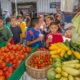 New Mexico, Louisiana community change grants: group of students visiting community food market
