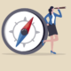 compass nonprofit leadership: illustration of dark-hared woman standing in profile wearing a business suit leaning against an over-sized compass looking through a long, hand-held telescope