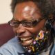 Henry Montgomery is free: laughing older black man with glasses, fasemask and headphones