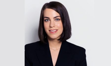 Romy Drucker named K-12 education director at Walton Family Foundation: dark-haired woman in business attire against bright background