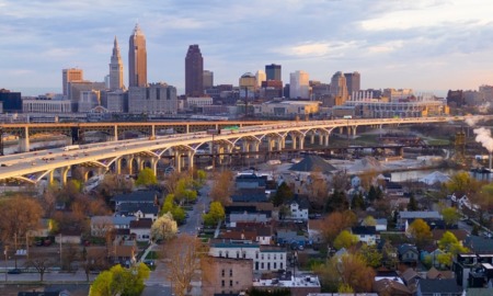 Cleveland healthcare, education, community grants; image of Cleveland communities with skyline behind