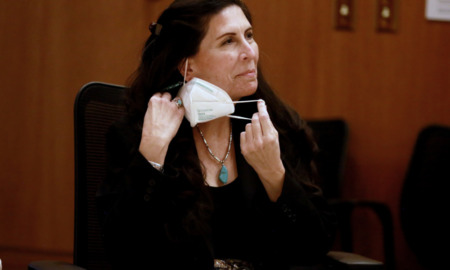 New Mexico new legal aid office for child welfare cases: Sen. Linda Lopez, middle-aged, dark-haired woman wearing black jacket woman lawmaker removing a white face mask