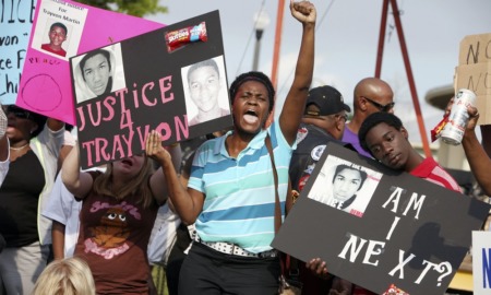Trayvon Martin 10 Years Later: image of protestors marching in the wake of Trayvon's death