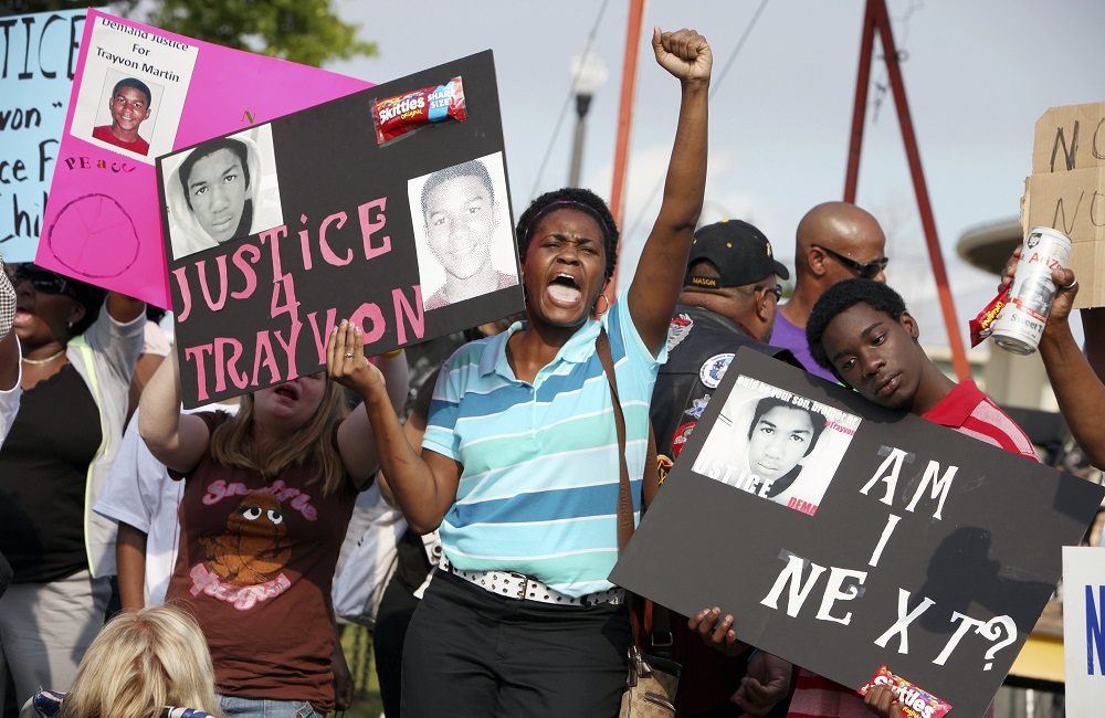 Trayvon Martin 10 Years Later: image of protestors marching in the wake of Trayvon's death