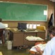 Former juvenile lifers reentry preparation analysis: old looking classroom with chalkboard and people working