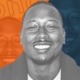 Eric Morrison-Smith named executive director: stylized orange and blue graphic with image of Black man smiling