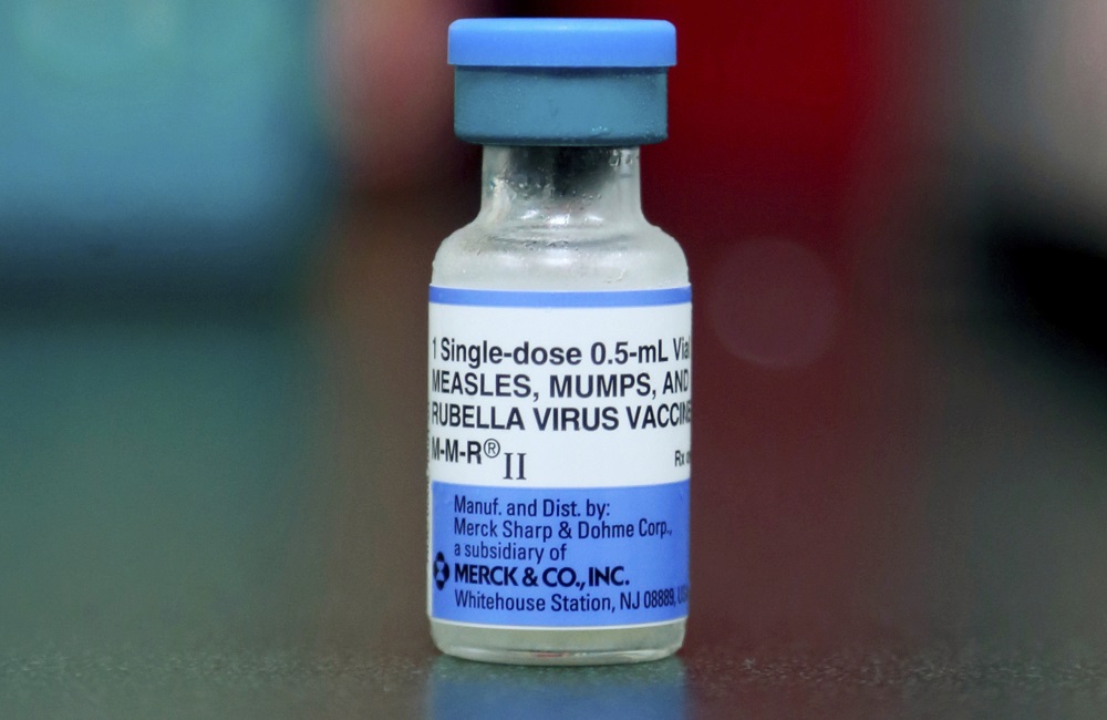 vaccination rates dip for kindergartners: vial of measles, mumps and rubella vaccine