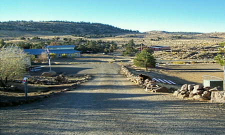 CInaha Springs Youth Camp: Entrance and buildings in desert landscape