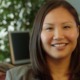 JooYeun Chang new director of child well-being at DDCF: Asian woman with hair to shoulders smiling at camera indoors
