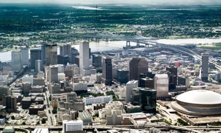 Greater New Orleans region grants: aerial view looking past downtown New Orleans and into the distance