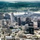 Greater New Orleans region grants: aerial view looking past downtown New Orleans and into the distance
