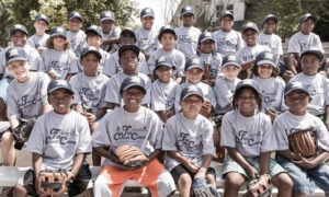Oregon, SW Washington youth sports, physical activity community grants: group of diverse young boys with baseball gloves and hats