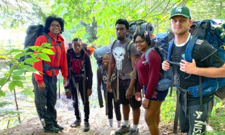 PreK-12 education national parks experience grants: group of diverse students standing among trees