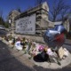 Funerals set for Nashville school shooting's 6 victims: entrance to church and school covered in memorial objects and balloon with names