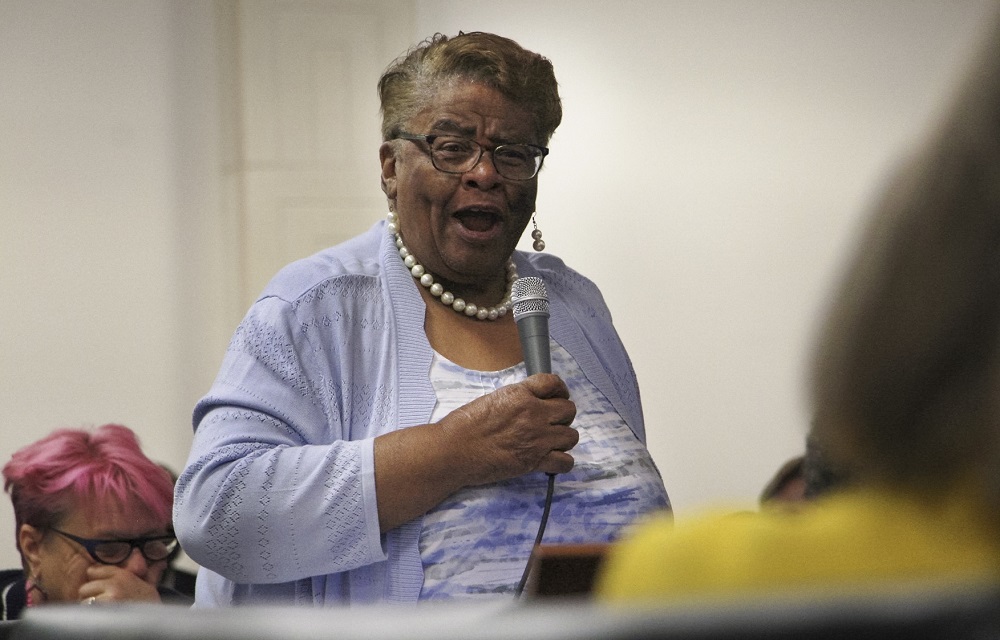 North Carolina House passes bill limiting racial teachings: older black woman talking animatedly into microphone