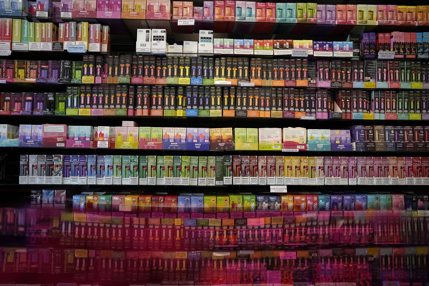 Unauthorized vapes pouring into the US: colorful wall full of vaping products