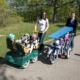 Minnesota expands public funding for childcare: two women in park with lots of small children in strollers
