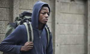 Gas, food, lodging for homeless students in jeopardy as funding deadline looms: homeless black teen with backpack on