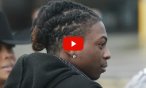 Texas Black haur ruling: Closeup profile of Darryl George, a Black teenager with long Black locs worn tied up close to his head