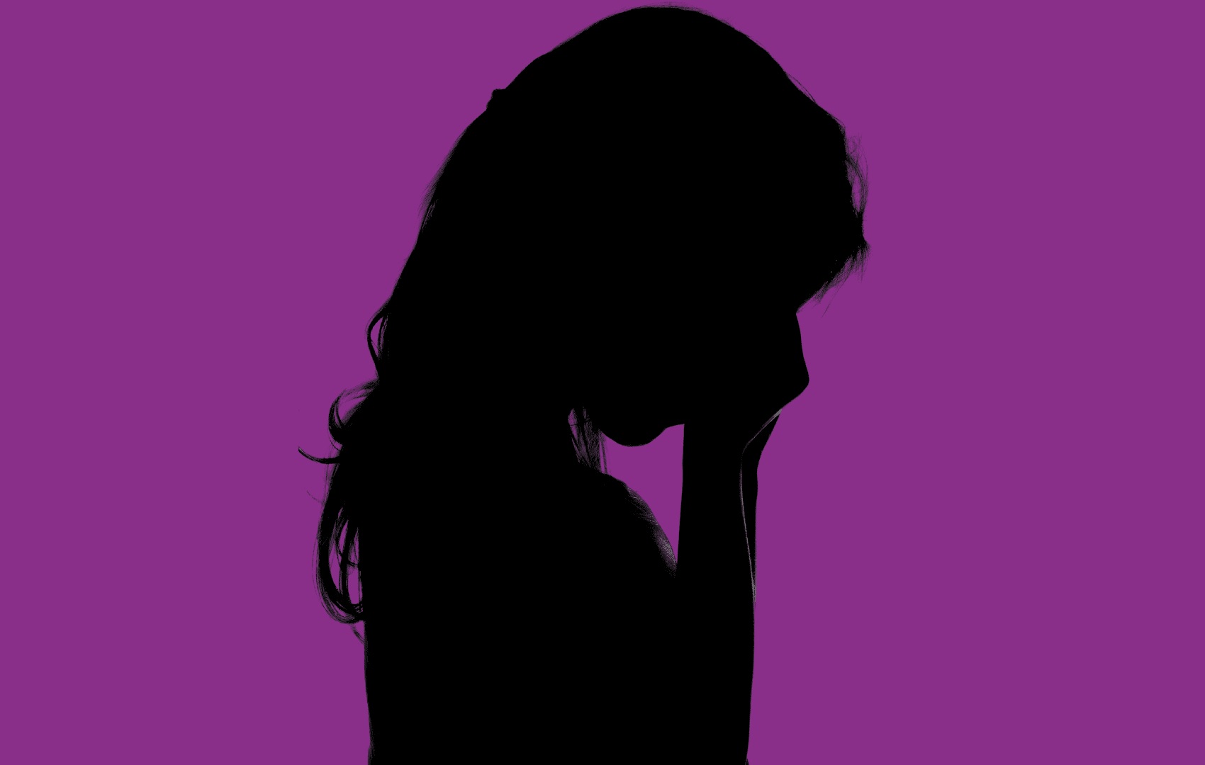 Pandemic-era funds for homeless students and youth: silhouette of young girl crying against purple background