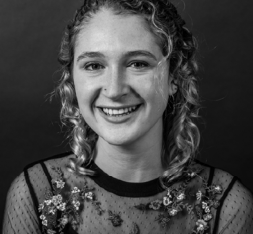 Student-led mental health groups: Black and white head shot of young woman with light hair pulled back in two braids