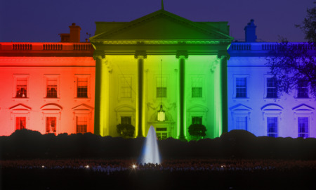 Title IX changes: White House in evening, Washington, DC with Rainbow Flag projected onto it, symbolizing screen court decision for the right of LGBT (Lesbians, Gays, Bisexuals and Trans-genders to marry).
