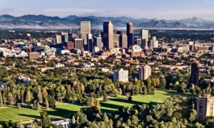 Denver area BIPOC and low-income community program grants: aerial view of Denver with mountains in the background