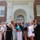 All charter no more_New Orleans opens first traditional school in nearly two decades: Group of people standing in front of school building and cutting ribbon