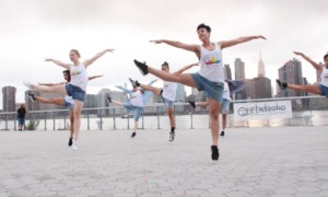 Queens arts project and culture project support grants: group of dancers dancing in front of river