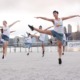 Queens arts project and culture project support grants: group of dancers dancing in front of river