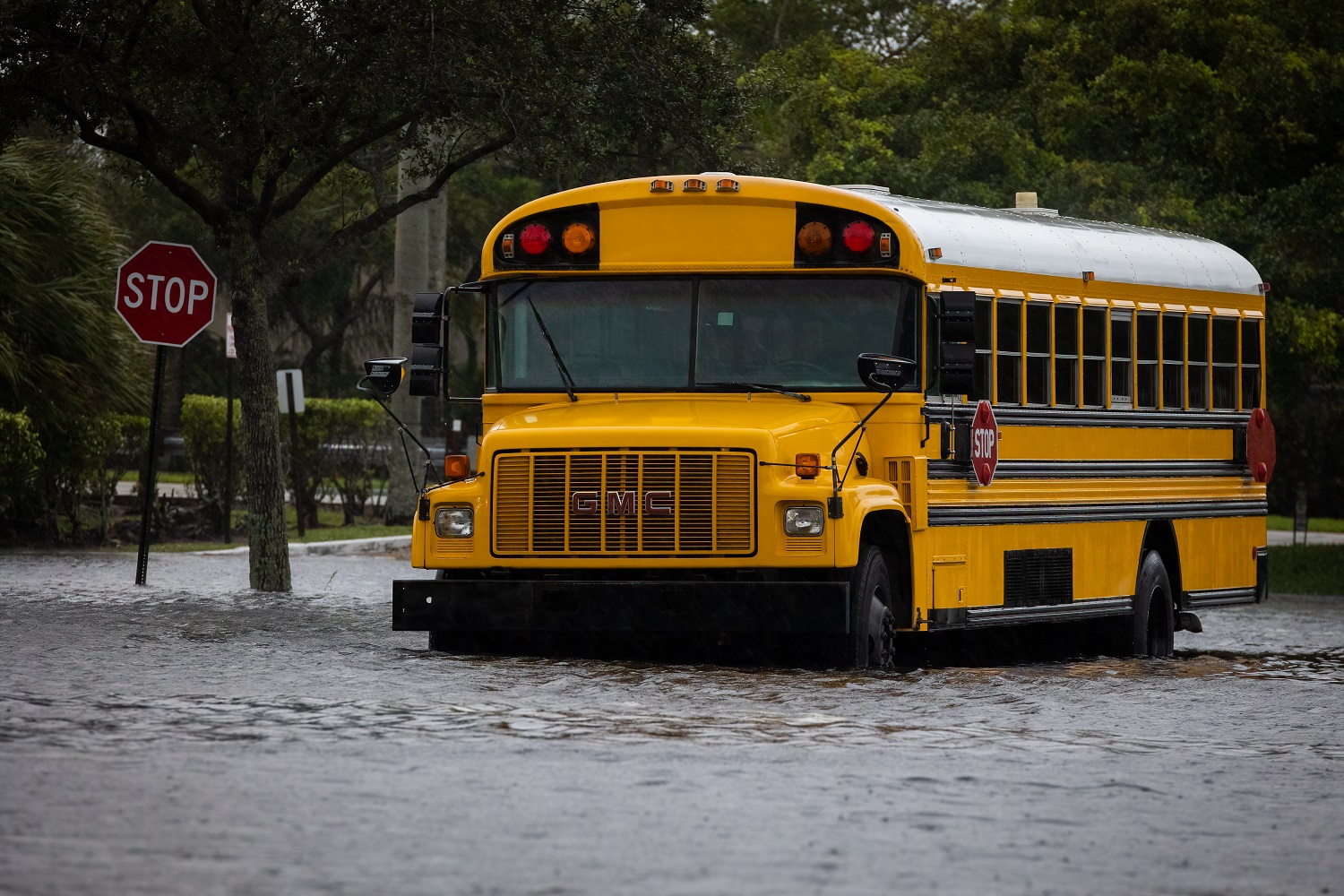 Schools after disasters, rebuilding after Helene and Milton: school bus stopped in flood waters