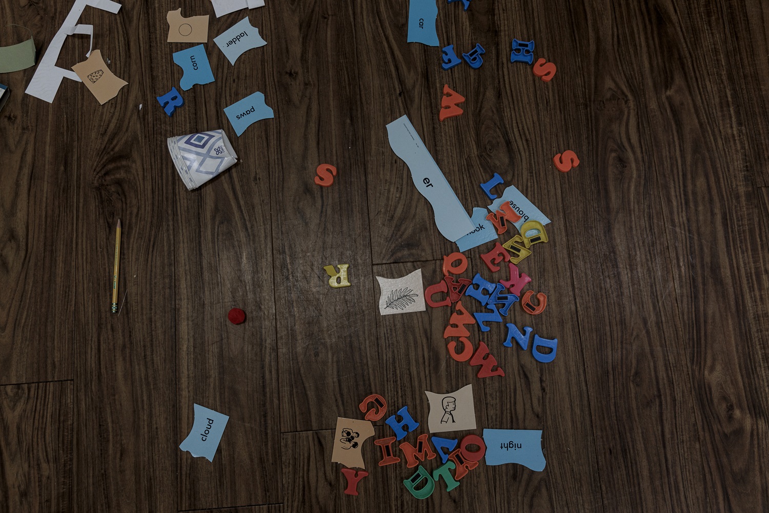 Arizona regulators closed failing charter school_It reopened private religious school funded by taxpayers: abandoned letters and literacy practice materials on wood floor