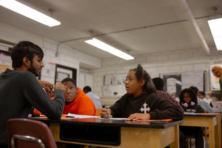 Maryland push to scale up high dosage math tutoring: Several Black teen students sit at desks in classroom