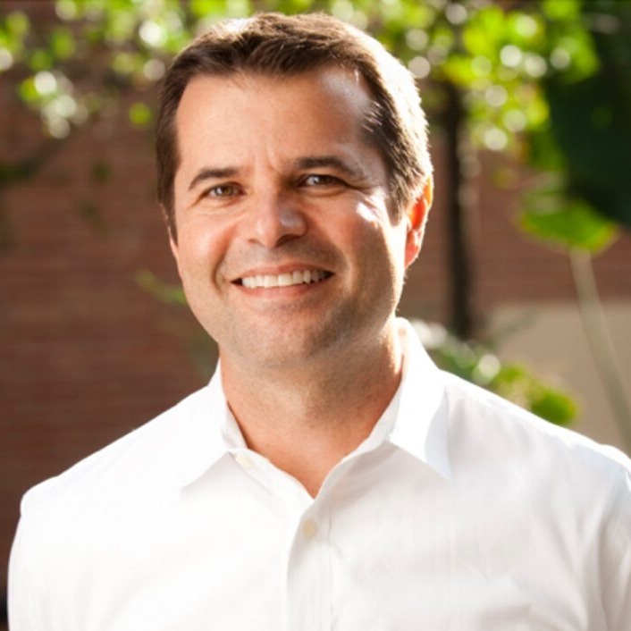 Climate change and adolescents: Man with brown hair in white business shirt