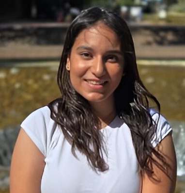 Climate change and adolescents: Older teen girl with long brown hair in white t-shirt