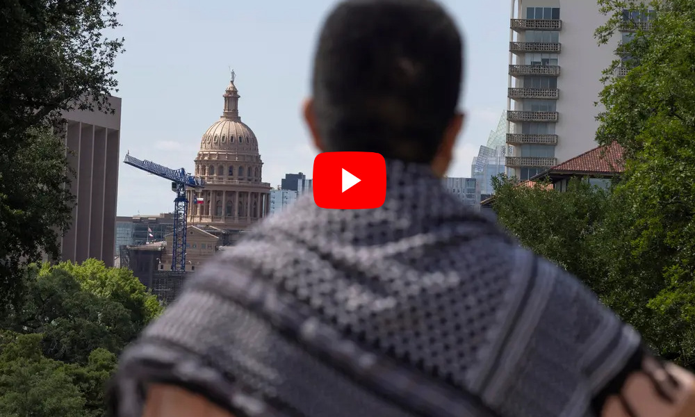 Texas international college students and deportation: Back view close up of person with plaid shawl over shoulders with TexasCapitol building in the background
