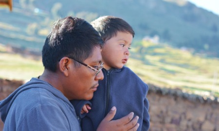 Native community grants: Native American father and son outdoors