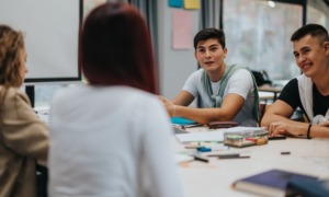 From curiosity to action_ youth participatory action research Network: group of youths working together at table