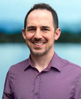 Michael Crawford headshot: white man with short dark hair in collared shirt smiling