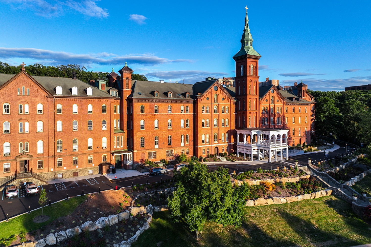 How a scholarship for homeless youth gave me the stability to build a future_feature: an old college building with tall tower on a nice day with clear, blue skies