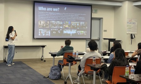 The power of youth voice _feature: female student gives presentation in front of classroom