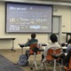 The power of youth voice _feature: female student gives presentation in front of classroom