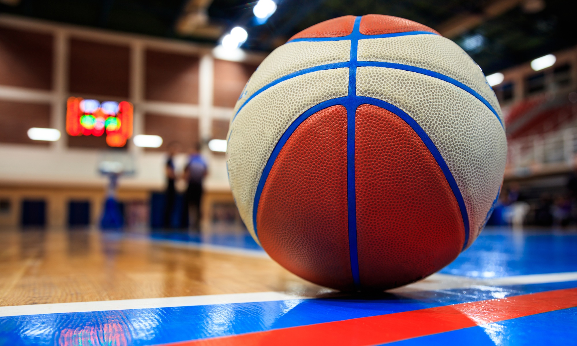Knicks CASEL 5-A blueprint for social-emotional competency _feature: a blue-lined basketball sits on a court with blue features