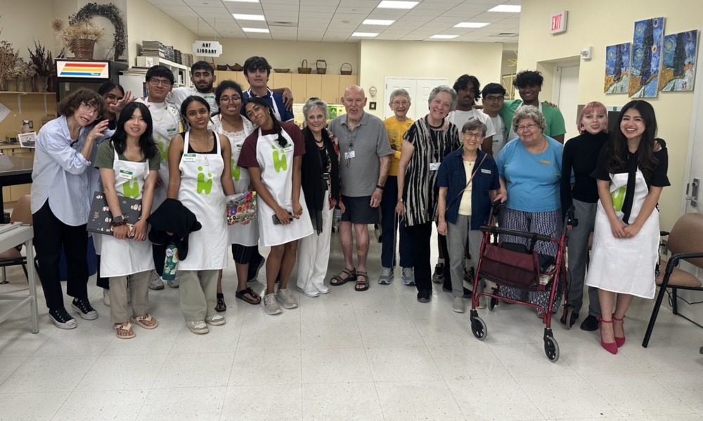 Youth development’s missing link-Intergenerational connection _feature: group photo of young and old people together
