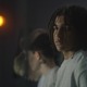 The boys we forgot to see-What working inside juvenile hall taught me about complex care_feature: young black teen standing in dark room in juvenile detention with other in background