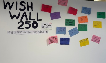 We've celebrated America’s 250th-Now what_feature, civics education : A student "Wish Wall" with colorful notes taped all over it
