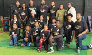 Four things navigating public-private community partnership taught me about leadership_feature: group of youth and adults in group posing for picture