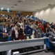 Global sustainability award grants for youth, universities, and organizations_feature: large group of happy people in presentation room