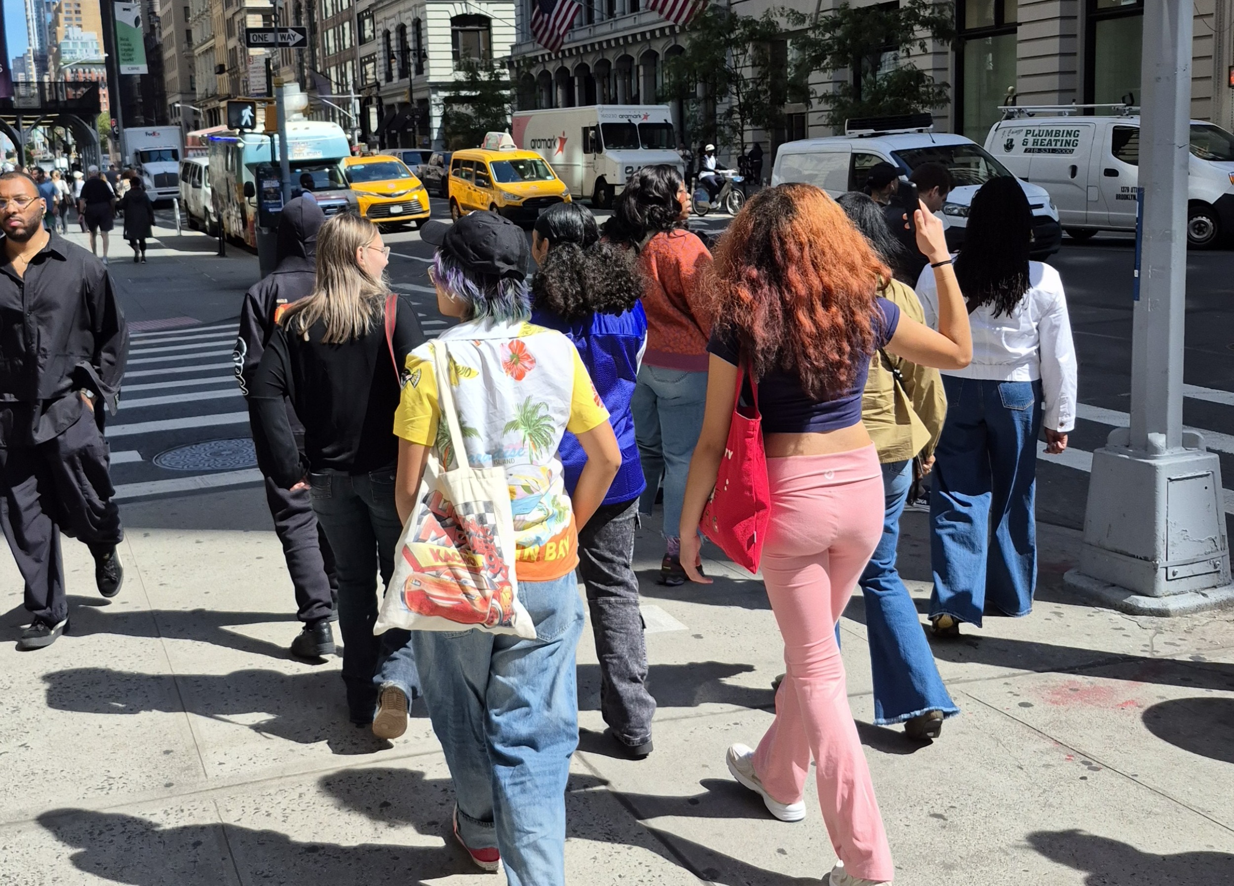 Fashion Forward Kinspire showed me my future was possible_The people and principles behind it_feature: group of young people walk along a New York City street
